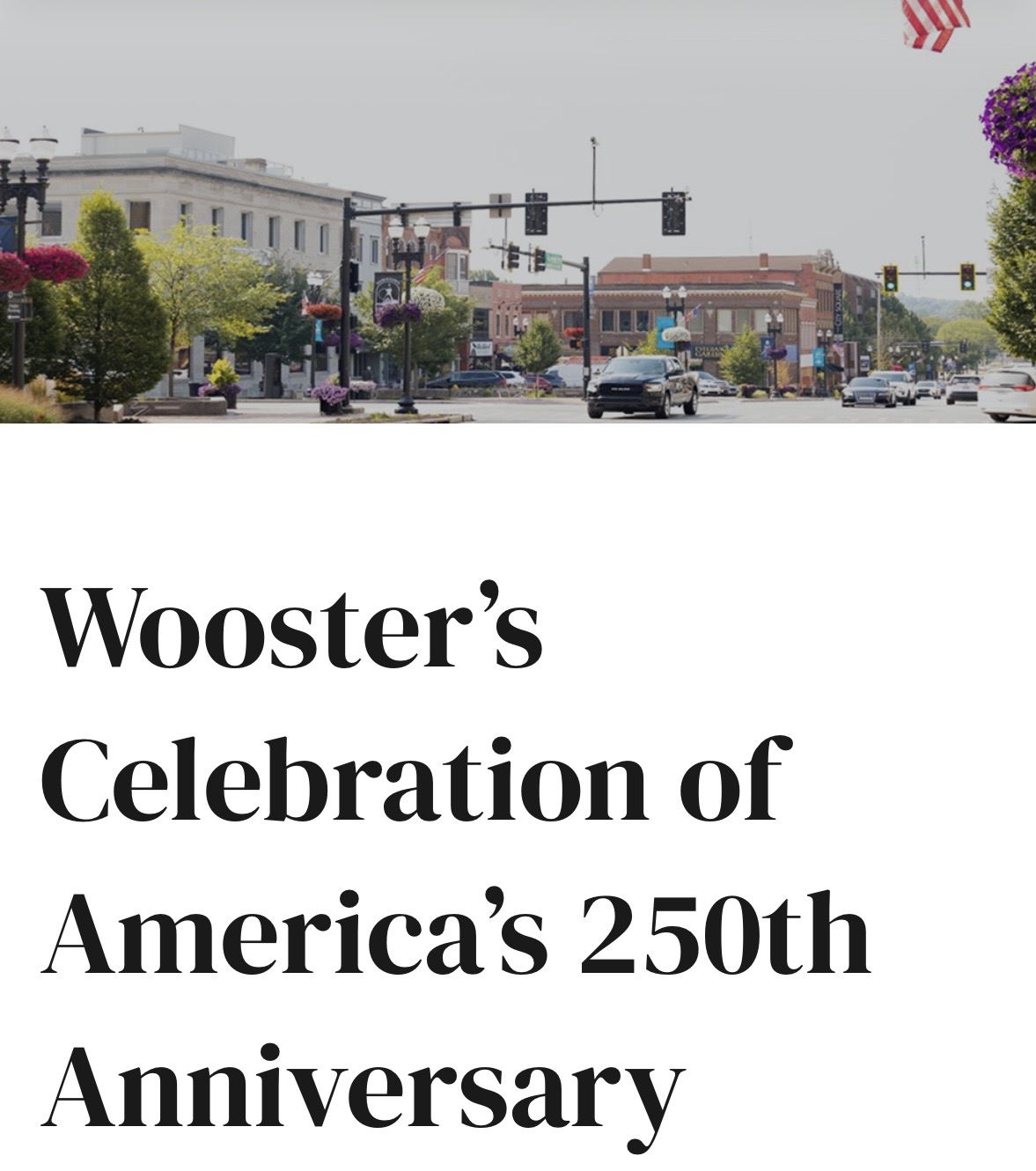 Screenshot - St. Paul Hotel | Boutique Hotel Wooster Ohio Town street scene with storefronts, cars, and hanging flower baskets; an American flag overhead; page heading reads “Wooster’s Celebration of America’s 250th Anniversary.”